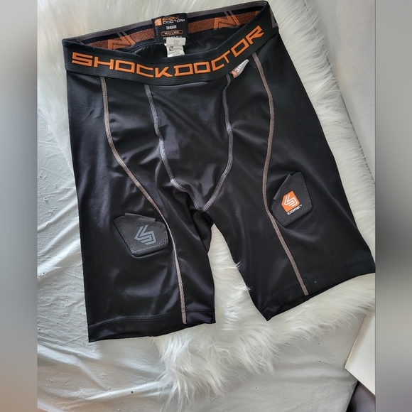 Shock Doctor Black and Orange Hockey Shorts, Size Large (28) - Picture 2 of 6